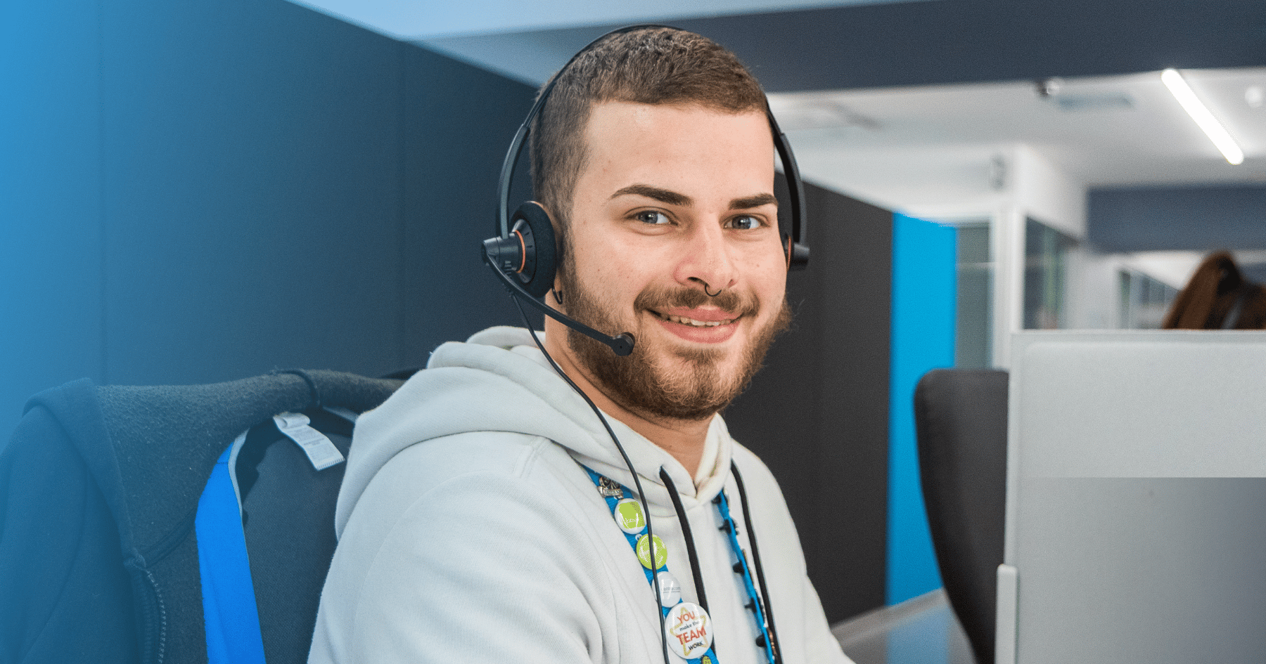 Call Centre Agent smiling working at a call centre